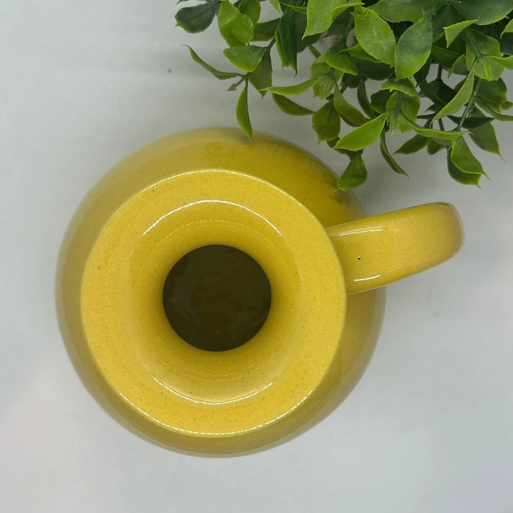 Frankoma Pottery Yellow MCM #82 Carafe dating back to the 1950s.